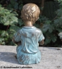 Bronzeskulptur Malbuch Junge