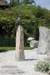 Bronze-Greifvogel Roter Milan auf Granitsäule