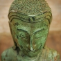Grünbemalte Buddhafigur