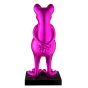 Rückenansicht der Froschfigur in pink