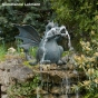 Lebensgroßer Drache als Wasserspeier.