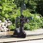Bronzeskulptur "Vier springende Delfine" als Wasserspeier
