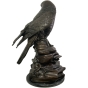 Bronzeskulptur "Mäusebussard auf Felsen"