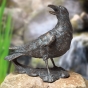 Bronzeskulptur "Rabe, drehend"