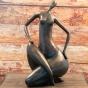 Bronzeskulptur "Sitzende Frau" - modern