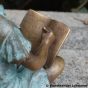 Junger Autor Gartenfigur