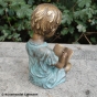 Bronzeskulptur Junge mit Buch