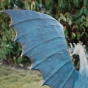 Rottenecker-Bronze-Drache Saphira als Wasserspeier auf Granitstein von Rottenecker
