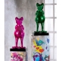 Frosch Figuren auf bunten Säulen