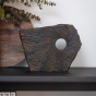 Bronzeskulptur "Resilience" von Marc Caelenberghe auf einer Kommode
