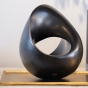 Infinito Skulptur aus Bronze in schwarz