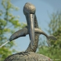 Fisch als Wasserspeier mit Reiher
