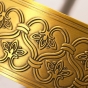 Sonnenuhr bronze gold
